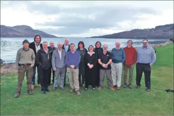  ??  ?? Delegates of the SEPA meeting with Terry A’Hearn and Howard Wood at the Marine Protected Area site.