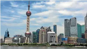  ?? SARAH CATHERALL ?? Across Huangpu River lies the Pudong New Developmen­t Zone, the future technology and financial capital of China.