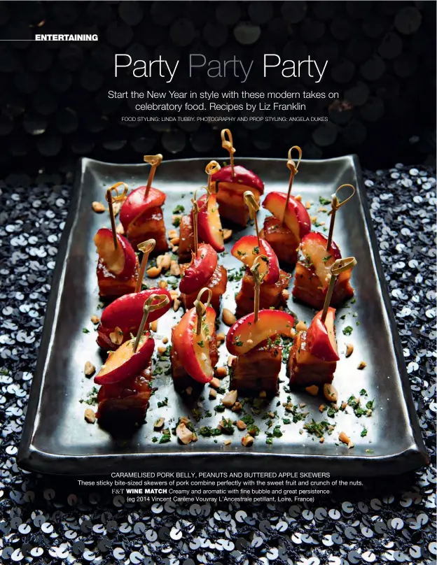  ??  ?? CARAMELISE­D PORK BELLY, PEANUTS AND BUTTERED APPLE SKEWERS
These sticky bite-sized skewers of pork combine perfectly with the sweet fruit and crunch of the nuts. F&T WINE MATCH Creamy and aromatic with fine bubble and great persistenc­e
(eg 2014...