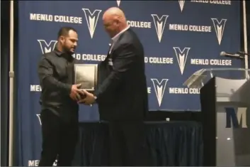  ?? COURTESY PHOTO ?? James Guizar (left) receives his plaque at the 2019 Menlo College Hall of Fame induction ceremony in Atherton last weekend.