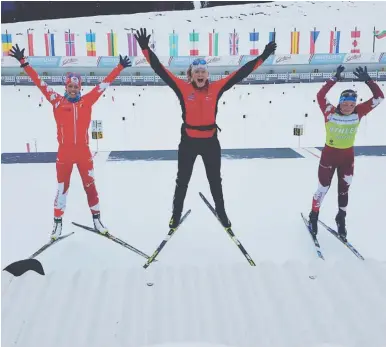  ?? HANDOUT PHOTO ?? Megan Tandy, left, Sarah Beaudry and Nadia Moser jump for joy before a World Cup biathlon race in Oberhof, Germany, on Thursday.