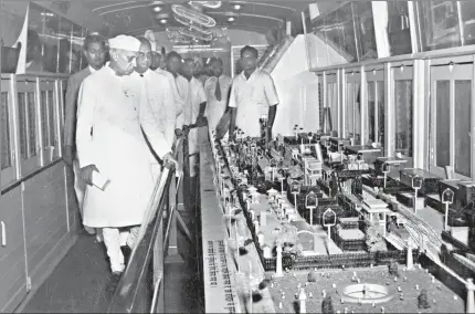  ?? HT FILE ?? Prime Minister Jawaharlal Nehru inspecting some of the exhibits of a railways exhibition before the launch of two special trains in 1953. At present, some areas of the Indian Railways have been privatised.