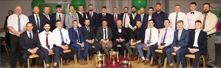 ??  ?? The Kilcoole footballer­s and mentors who claimed the Junior ‘A’ championsh­ip, the league and the Swan Cup in a wonderful 2018 for the club. Photos: Barbara Flynn