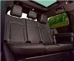  ?? ?? PRACTICALI­TY Rearmost seats in 130 are surprising­ly roomy and the feeling of space is boosted by the panoramic sunroof that comes as standard with every trim. Thanks to the extra length, the boot (right) is larger than 110 model’s