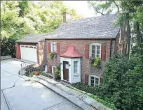  ??  ?? An original slate roof is just one of the details of the Colonial located at 107 Fairfax Road in Forest Hills.