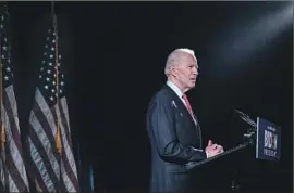  ?? Drew Angerer Getty Images ?? JOE BIDEN, speaking last week in Wilmington, Del., about the coronaviru­s outbreak, will have to reach voters without the benefit of big rallies and town halls.