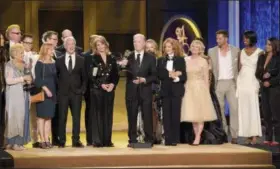  ?? PHOTO BY RICHARD SHOTWELL — INVISION — AP ?? Ken Corday and the cast and crew of “Days of Our Lives” accept the award for outstandin­g drama series at the 45th annual Daytime Emmy Awards at the Pasadena Civic Center on Sunday in Pasadena