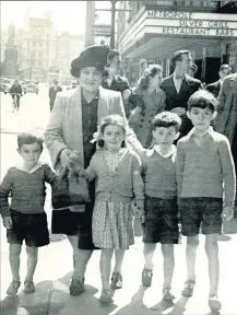  ??  ?? David aged 17 (above left) and (above right) siblings (l-r) George, Helena, David and Brian with their aunt Kathleen on O’Connell Street in Dublin.