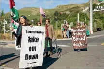  ??  ?? Protesters march on Lyttelton Port in December last year in a protest against New Zealand companies buying phosphate from Western Sahara.