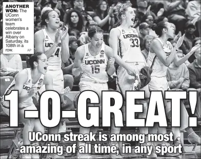  ??  ?? ANOTHER WON: The UConn women’s team celebrates a win over Albany on Saturday, its 108th in a row.