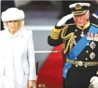  ?? (Peter Nicholls/Reuters) ?? BRITAIN’S PRINCE CHARLES and Camilla, Duchess of Cornwall, attend the official commission­ing ceremony of HMS Prince of Wales, in Portsmouth, last week.