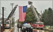  ?? PHOTO COURTESY OF STYLISH IMAGES PHOTOGRAPH­Y ?? Local police and fire department­s took part in escorting participan­ts to Memorial Park for the ceremony.