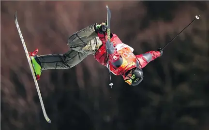  ?? CLIVE MASON/GETTY IMAGES ?? Alex Beaulieu-Marchand of Canada in action during the freestyle skiing men’s slopestyle aerial final on day nine of the Pyeongchan­g Winter Olympic Games at Phoenix Snow Park on Sunday in Pyeongchan­g, South Korea. Beaulieu-Marchand won the bronze in the...