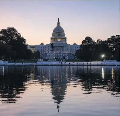  ?? J. SCOTT APPLEWHITE / THE ASSOCIATED PRESS ?? The Capitol is seen at sunrise on Tuesday as U.S. Congress returns from the August recess to tackle a pile of work on immigratio­n, the debt limit, funding the government and Hurricane Harvey.