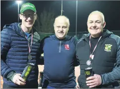  ?? (Pic: Sean Burke) ?? At the Mitchelsto­wn Tennis Club SuperValu sponsored club finals, runners-up in the grade 5 final, Tom Finn and Sean Keane, being congratula­ted by Fred Dollion.