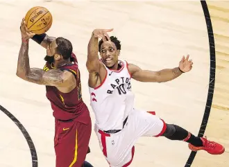  ?? PETER J. THOMPSON ?? LeBron James and the Cleveland Cavaliers won Game 1 over DeMar DeRozan and the Toronto Raptors Tuesday, but if not for one incredibly unlucky sequence at the end of the regulation time, it could easily be Toronto holding the early lead in their...