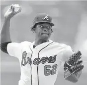  ?? KEVIN C. COX/GETTY IMAGES ?? Former Coral Springs Christian Academy star Touki Toussaint pitches against the Marlins on Monday.