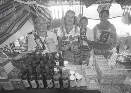 ?? Photo by Jean Nicole Cortes ?? FOR SALE. Locals from Kalinga proudly showcase their products sold at the Kalinga booth during the 5th Organic Congress held at the Benguet Agri-Pinoy Trading Center in La Trinidad.