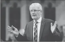  ?? CP PHOTO ?? Transport Minister Marc Garneau rises in the House of Commons in Ottawa.