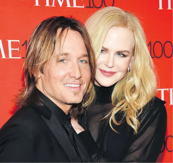  ?? — THE ASSOCIATED PRESS FILES ?? Keith Urban and Nicole Kidman make it a family affair on his new album, which features not only songs that were inspired by Kidman but she also provides some backup vocals.