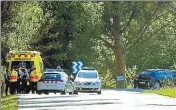  ?? AFP ?? Policemen and medical staff after Moroccan suspect Younes Abouyaaqou­b was shot on Monday.