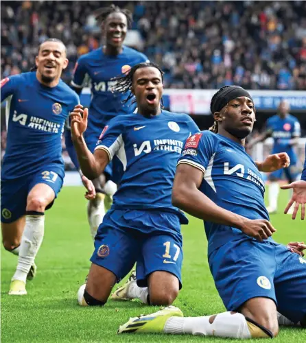  ?? ?? Slide rule: Madueke celebrates with his team-mates after curling in Chelsea’s fourth goal and (right) Palmer shows the fans some love