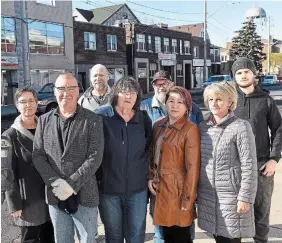  ?? BARRY GRAY THE HAMILTON SPECTATOR ?? From left, Liz Duval, Walter Furlan, James Bichette, Lena Sutton, Norman Robinson, Khanh Tran, Luba Mudrak, and Jared Furlan. The business owners and residents on a section of Barton Street East near Lottridge are upset over plans to establish a safe injection site to their area.