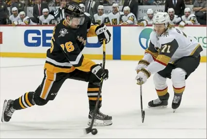  ?? Matt Freed/Post-Gazette ?? NHL DEBUT Right winger Valtteri Puustinen, 22, of Finland made his Penguins and NHL debut Friday night against the Golden Knights, skating on Jeff Carter’s right wing. He notched his first career point on Carter’s goal in the second period.