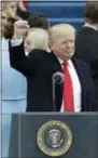  ?? THE ASSOCIATED PRESS ?? President Donald Trump waves Friday after being sworn in as the 45th president of the United States.