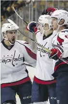  ??  ?? Washington Capitals centre Nicklas Backstrom, right, celebrates a goal against the Pittsburgh Penguins in Game 6 on Monday night in Pittsburgh.