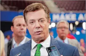  ?? MATT ROURKE/AP PHOTO ?? Then-Trump Campaign Chairman Paul Manafort talks to reporters in July 2016 on the floor of the Republican National Convention in Cleveland.