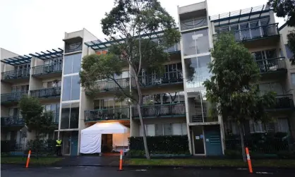  ?? Photograph: James Ross/EPA ?? The locked-down Southbank apartment complex in Melbourne. Restrictio­ns will ease despite Victoria recording five new local Covid cases overnight.