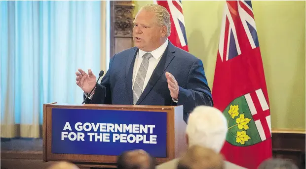  ?? TIJANA MARTIN / THE CANADIAN PRESS ?? Premier-designate Doug Ford addresses the first meeting of the newly-elected Ontario PC caucus at Queen’s Park in Toronto on Tuesday. The Ford government takes over June 29, and reality will hit hard, writes David Reevely.