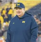  ?? MICHIGAN ATHLETICS ?? Biff Poggi, 62, left St. Frances last year to become associate head coach for Michigan, which made the 2021 College Football Playoff before losing to Georgia in the Orange Bowl and is 10-0 this season.