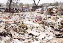  ?? — ?? Uncollecte­d garbage piles up near blocks of flats in Mbare and at Market Square bus terminus in Harare. Pictures: Memory Mangombe