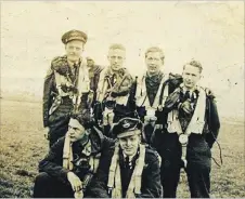  ?? HANDOUT PHOTO ?? Royal Canadian Air Force crew members. The airman on the far right, the shortest fellow in the picture, is Reginald Bertram Smith.