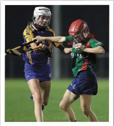  ??  ?? Annie Kellyy (St. Mary’s)y) tackles Cíabha Cartyy (Rapparees). )