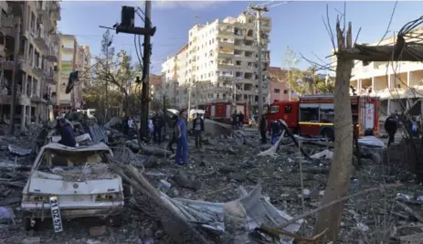  ?? THE ASSOCIATED PRESS ?? A large explosion hit Diyarbakir in Turkey’s mainly Kurdish southeast region on Friday, wounding several people, state-run Anadolu Agency reported.