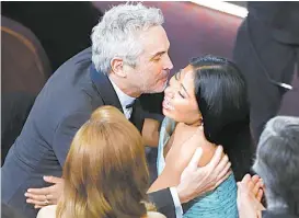  ?? REUTERS ?? Alfonso Cuarón y Yalitza Aparicio.