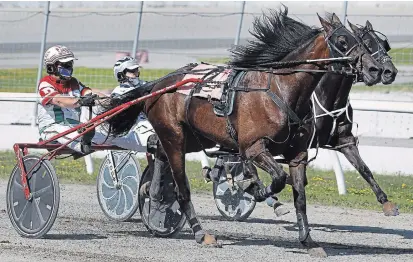  ?? CLIFFORD SKARSTEDT EXAMINER FILE PHOTO ?? Harness racing will continue at Kawartha Downs thanks to a new deal announced by the province last week.