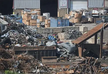  ?? Post-gazette.com. Steve Mellon/Post-Gazette ?? Metalico Pittsburgh’s facility on Neville Island specialize­s in recycling and processing scrap metals, according to the firm’s website. For more photos, visit