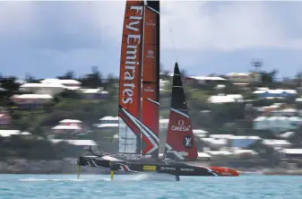  ?? Clive Mason / Getty Images ?? Emirates Team New Zealand zips through the waters off Bermuda on hydrofoils during its America’s Cup-clinching win over Oracle Team USA on Monday.