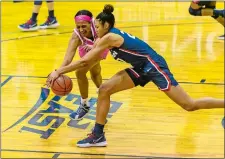  ?? RAFAEL SUANES/GEORGETOWN ATHLETICS ?? UConn’s Olivia Nelson-Ododa, right, battles for a rebound during the No. 2 Huskies’ 64-40 Big East Conference win over Georgetown on Friday night in Washington.