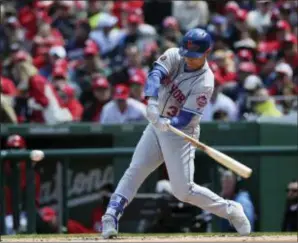  ?? THE ASSOCIATED PRESS ?? Mets outfielder Michael Conforto swings during Thursday’s game against the Washington Nationals. Conforto was activated off the disabled list and made his season debut.