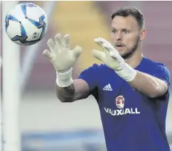  ??  ?? Safe hands: Trevor Carson is relishing the fight for the No.1 spot