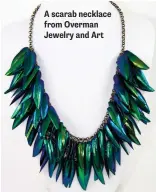  ??  ?? A scarab necklace from Overman Jewelry and Art