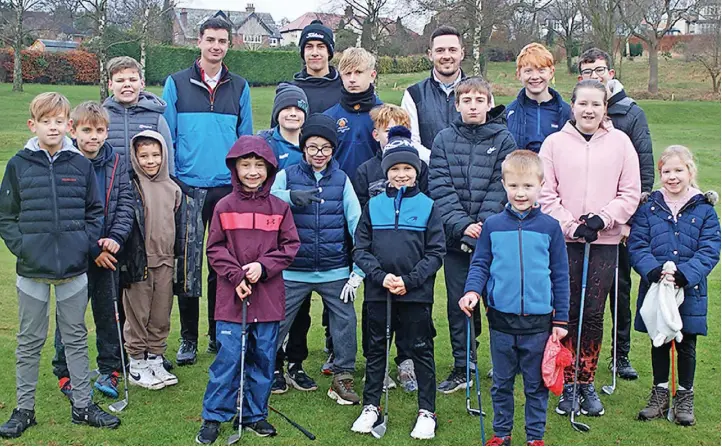  ?? ?? ●●Graham Drabble with a group ready for putting and chipping in the practice area