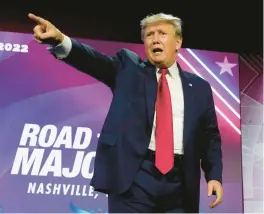  ?? MARK HUMPHREY/AP ?? Former President Donald Trump points to the crowd as he leaves the stage after speaking at the Faith and Freedom Coalition event Friday in Nashville, Tennessee.