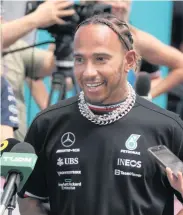  ?? CARL JUSTE cjuste@miamiheral­d.com ?? Lewis Hamilton fights for global causes as well as more personal ones — like his desire to wear jewelry when he races.