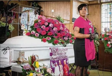  ?? CONTRIBUTE­D BY SHAWN JOHNSON ?? Shawn Johnson, who owns her own Riviera Beach-based funeral services company, was the November model in the 2015 Mortician Moms calendar. She’s also been called the Beyonce of Funerals.